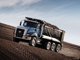 Dump truck dirt road desert - a dirt road in the desert free wallpaper