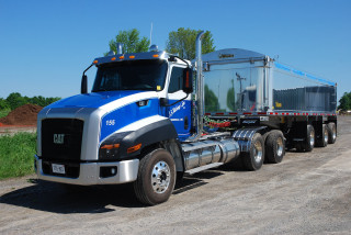 Large semi truck parked dirt - a trailer free wallpaper