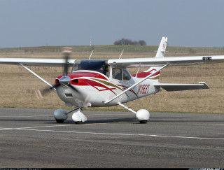 Small plane runway person walking - front view free wallpaper