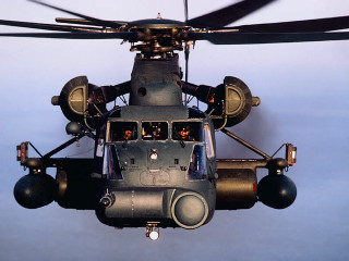 Military helicopter flying blue sky 2 - a military helicopter free wallpaper