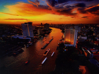 River boats city sunset colorful - a colorful sky free wallpaper