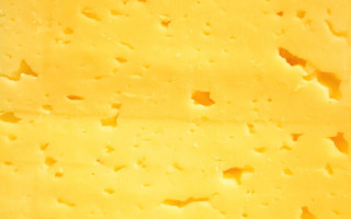 Cheese holes yellow background white - center free wallpaper