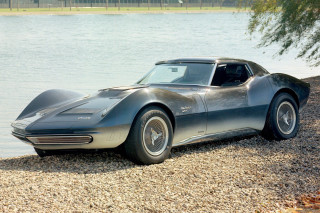 Black sports car rocky shore - rocky free wallpaper