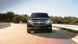 Black truck driving road forest - a road next free wallpaper