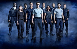 Group people dark smoke man - smoke behind them free wallpaper