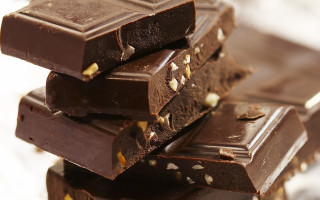 Chocolate bars stack table top - decadent free wallpaper