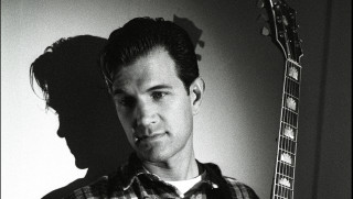 Man holding guitar shadow person - david lazar free wallpaper