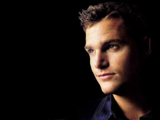 Man black shirt serious look 9 - andrew bell free wallpaper