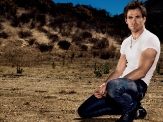 Man sitting desert mountain background - fine art free wallpaper
