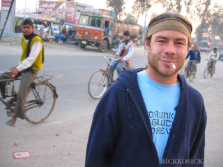 Man cigarette street bicyclists group - the middle of a street free wallpaper