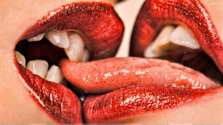Close up woman mouth red - tongue free wallpaper