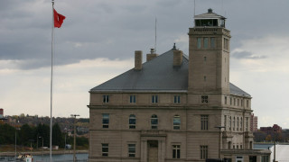 Large building clock tower flag 3 - a clock tower free wallpaper