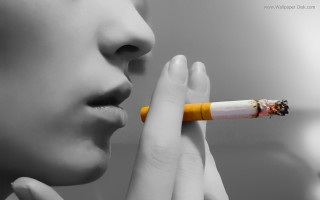 Woman smoking cigarette lighter mouth - her mouth and a cigarette free wallpaper