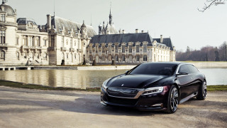 Black car large building lake - luxury free wallpaper