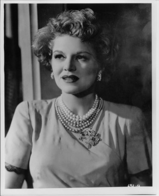 Woman necklace pearls black white - a window behind her free wallpaper