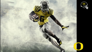 Football player yellow uniform running - a football player free wallpaper