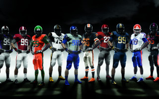 Football players standing helmets hands 2 - helmet free wallpaper