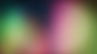 Blurry image of a green - chromatic free wallpaper