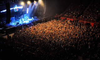 Concert crowd arena stage lights - a large crowd of people free wallpaper