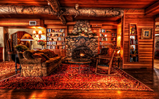 Living room fireplace rug couch - warm lighting free wallpaper