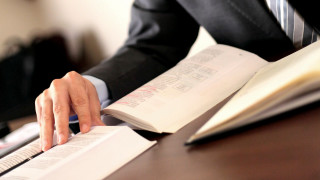 Man suit reading book desk - afewerk tekle free wallpaper