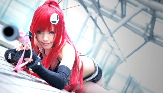Woman red hair black top 2 - a ledge free wallpaper
