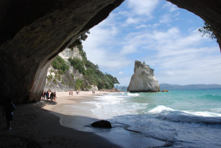 Beach people ocean cave rock - sandy free wallpaper
