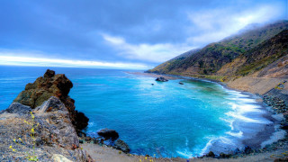 Beach mountain water foreground scenery 2 - a view of a beach free wallpaper
