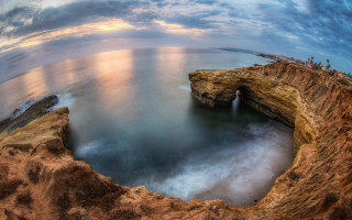 Large water rocky cliff waterfall - a large body of water free wallpaper