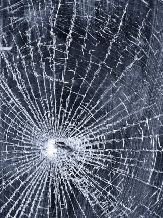 Cracked glass window black background - cracked free wallpaper
