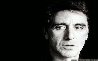 Serious man black background white - detailed face free wallpaper