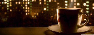 Coffee cup saucer window cityscape - a cityscape in the background free wallpaper