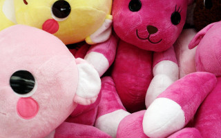 Pink yellow stuffed animals with - different color and shapes free wallpaper