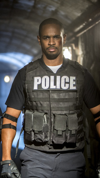 Police officer walking street uniform - derek hill free wallpaper