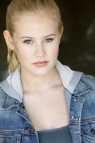Woman denim jacket serious pose - serious free wallpaper