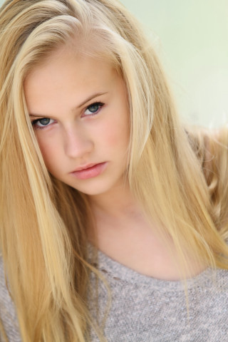 Blonde woman blue eyes serious 7 - portrait photography free wallpaper