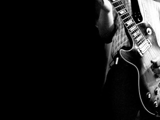Man holding guitar serious look 3 - david gilmour blythe free wallpaper