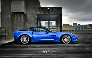 Blue sports car parking lot 6 - cloudy free wallpaper