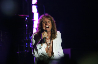 Woman singing microphone dark room - a. b. jackson free wallpaper