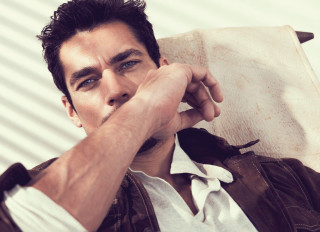 Man book serious look camera - david small free wallpaper