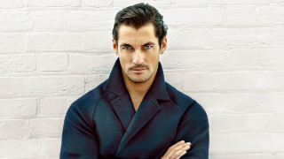Man blue coat white wall - andrew bell free wallpaper