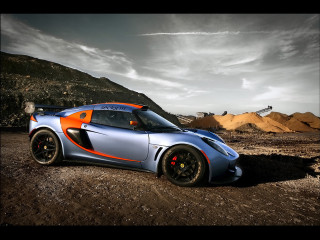 Blue orange sports car desert - a dirt road in the desert free wallpaper