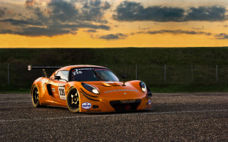 Sports car sunset road clouds - a sunset in the background free wallpaper
