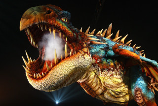 Large colorful dragon statue mouth - tooth wide free wallpaper