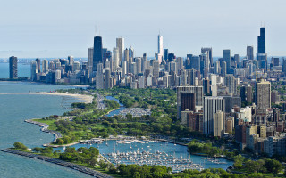 City skyline harbor boats bridge - a large city in the background free wallpaper
