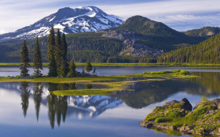 Mountain lake trees snow capped 2 - peak in the distance free wallpaper