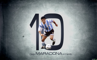Man blue uniform kicking soccerball - a soccer ball free wallpaper