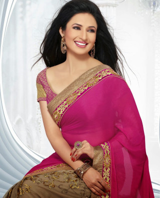 Woman pink gold sari smiling - the camera free wallpaper