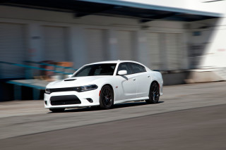 White car driving street building 6 - private press free wallpaper