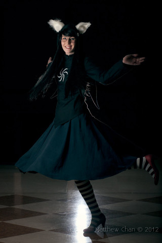 Dancing woman cat costume checkered - floor free wallpaper